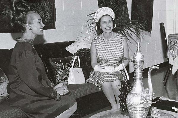 Her Majesty Queen Elizabeth II visits Mrs. E. Egorov (left), who presented her new flat typical of workers at the Mount Isa mines, 16 April 1970.
